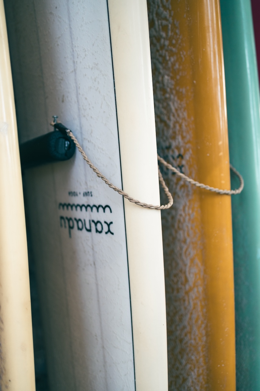 Row of colorful surfboards at Xanadu Resort in Lombok