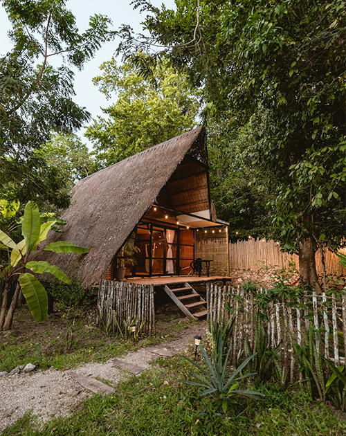 Sustainable A-frame cabin at Azul Nomeolvides, designed with local materials in the Mayan jungle