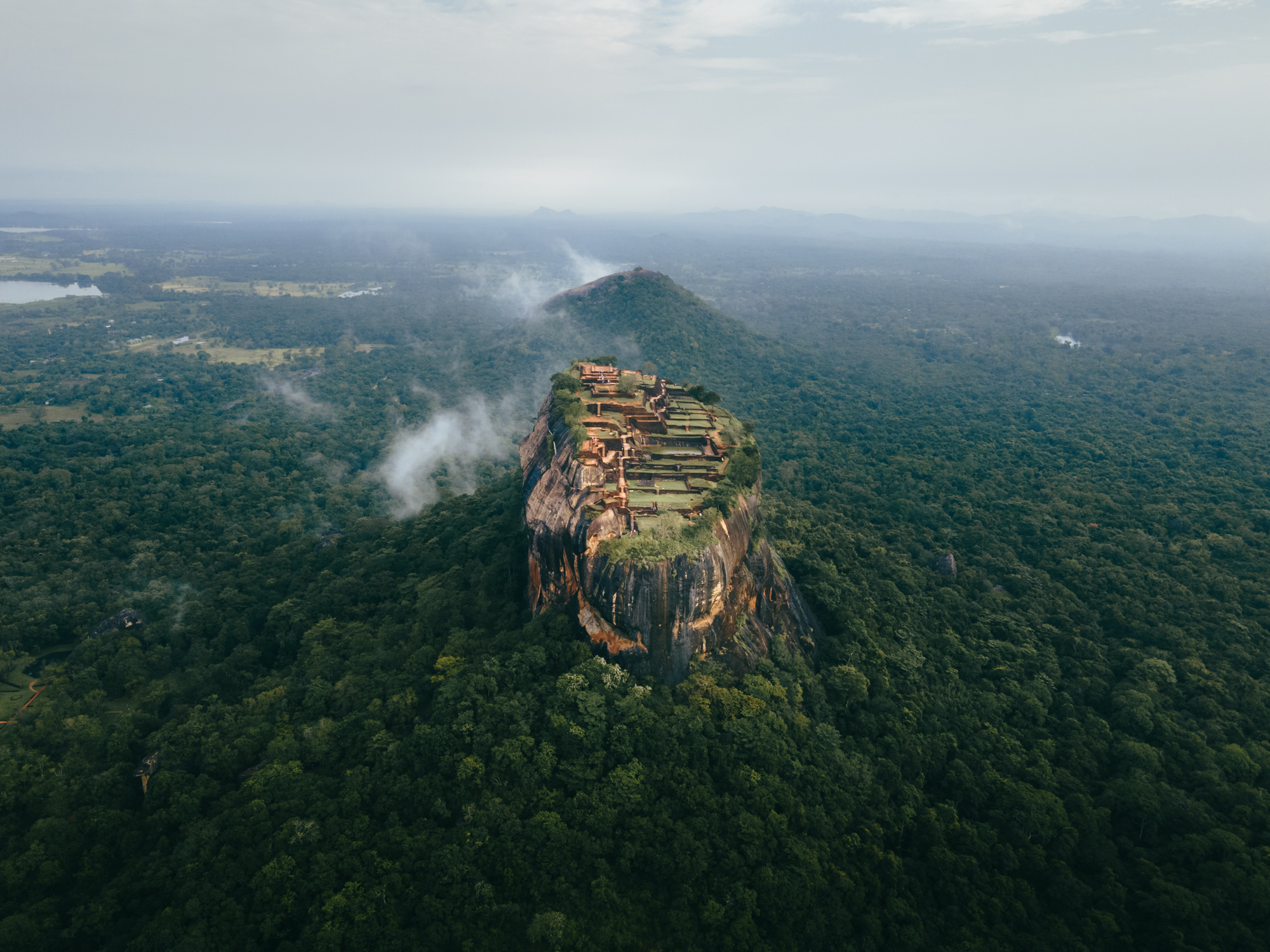 Aerial View of Lion's Rock in Sri Lanka Surrounded by Jungle